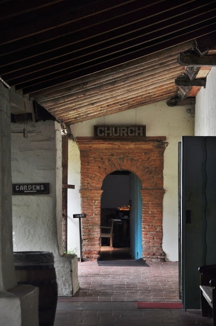 Mission San Juan Batista church entrance from the garden